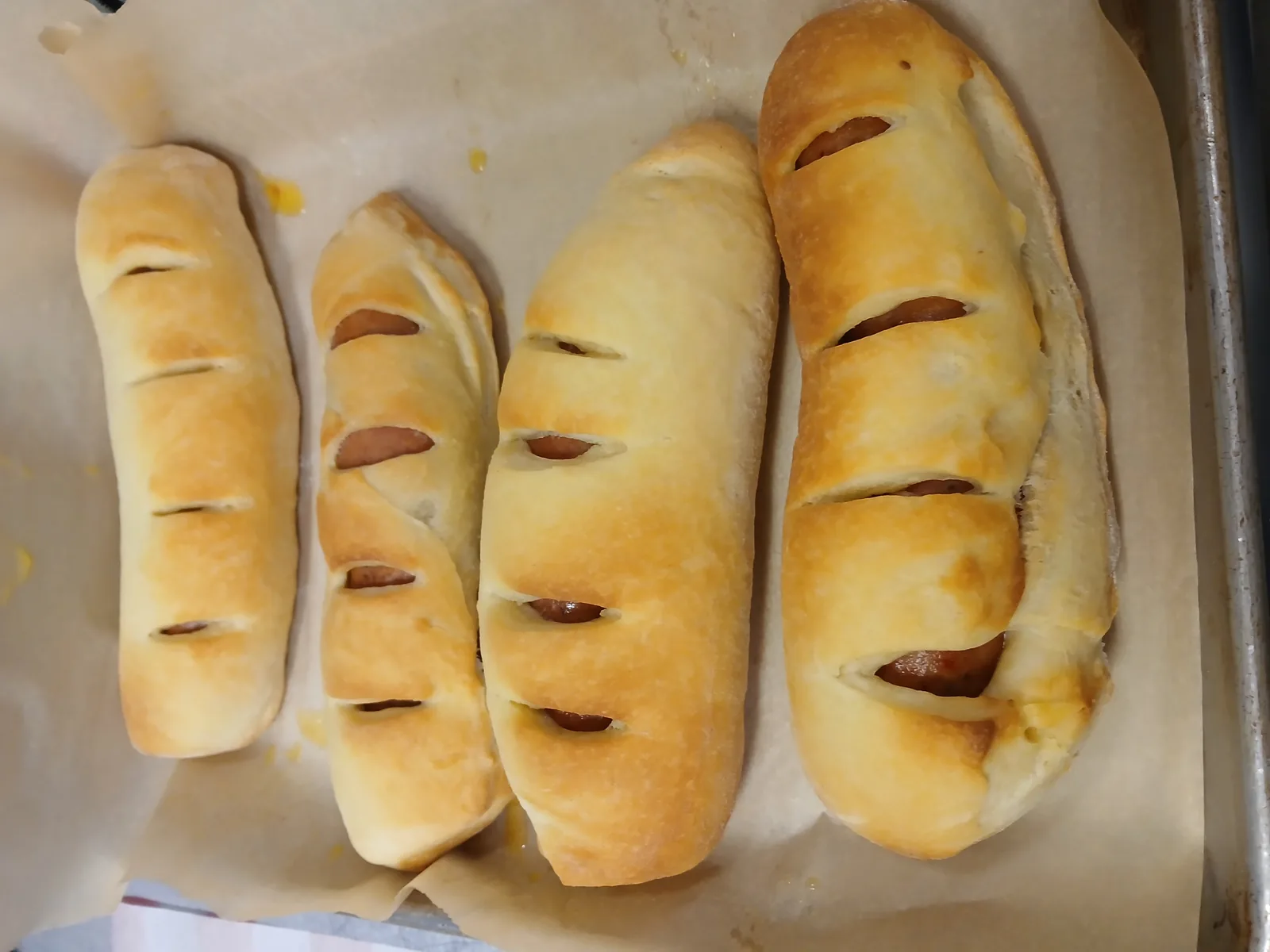 Sausage kolaches wrapped in Doughboys donut dough, fresh from the oven