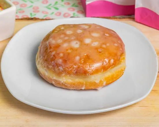 A glazed Bismark filled donut