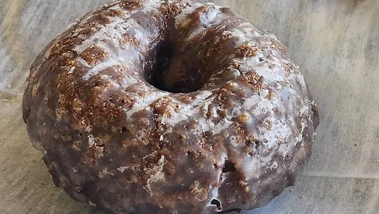 A glazed Devil's Food cake donut